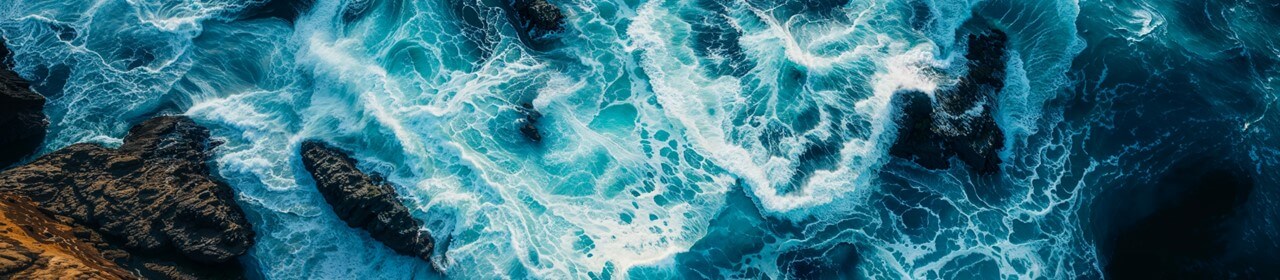 waves-hitting-rocky-shoreline-1280x280 (1)